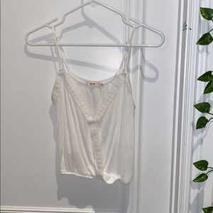 size small white cropped t bought at a surf shop